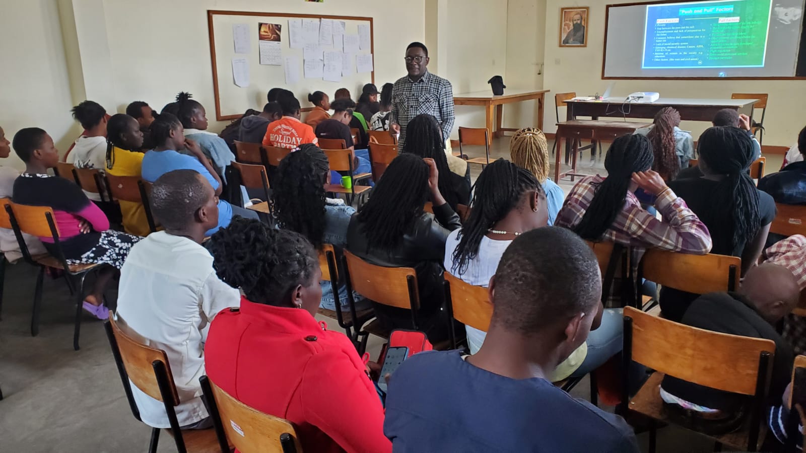 Young people at KEYSA's Nairobi youth empowerment forum, following a presentation on the push and pull factors behind human trafficking